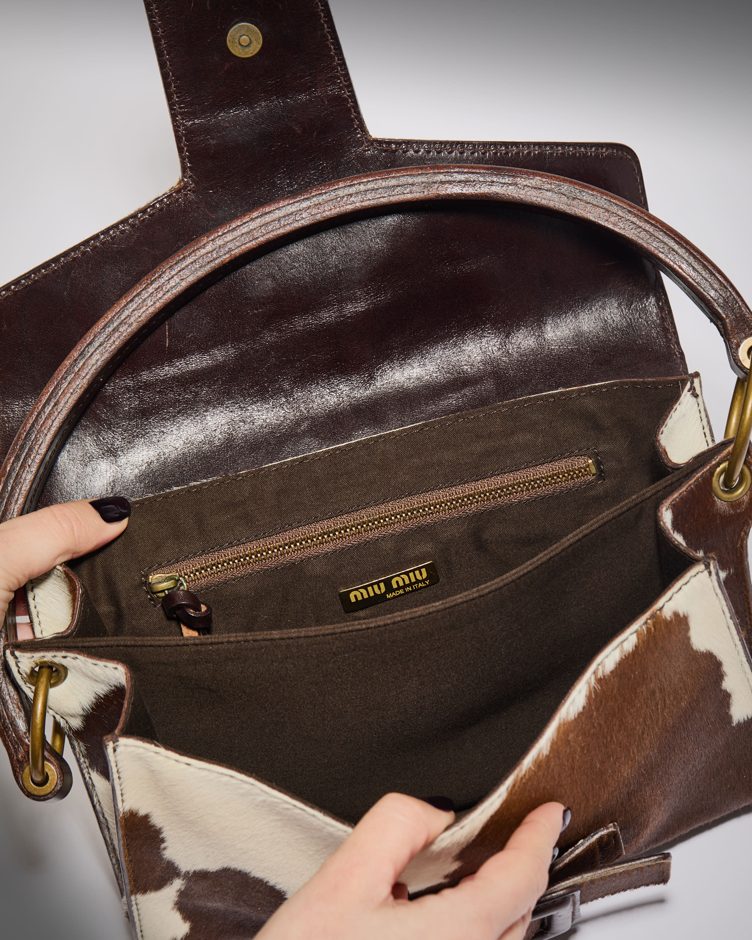 Interior of vintage Miu Miu pony hair shoulder bag.